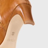 JONES + CO STAUD Wally ankle boot in distressed cashew leather featuring a slim blade heel and leather sole