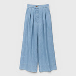 JONES + CO celeste blue organic cotton wide-leg trousers with front pleats and a high-waisted fit.