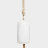 JONES + CO Thrown Bell in Domino Indigo, a white ceramic hanging bell with a rustic rope and wooden clapper.