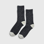 JONES + CO charcoal melange cashmere blend socks with wide ribbing and contrasting light grey heel and toe details.