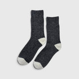 JONES + CO charcoal melange cashmere blend socks with wide ribbing and contrasting light grey heel and toe details.