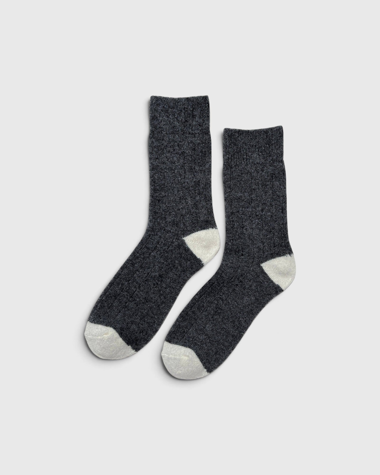 JONES + CO charcoal melange cashmere blend socks with wide ribbing and contrasting light grey heel and toe details.