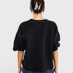 JONES + CO Rachel Comey charcoal Fond sweatshirt with drop shoulders and raw edge hem, back view on a model.