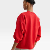 JONES + CO Rachel Comey Fond crewneck sweatshirt in cherry red with drop shoulders and raw edge hem, back view