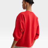 JONES + CO Rachel Comey Fond crewneck sweatshirt in cherry red with drop shoulders and raw edge hem, back view