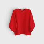 JONES + CO Rachel Comey Fond crewneck sweatshirt in cherry red with drop shoulders and raw edge hemline.