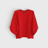 JONES + CO Rachel Comey Fond crewneck sweatshirt in cherry red with drop shoulders and raw edge hemline.