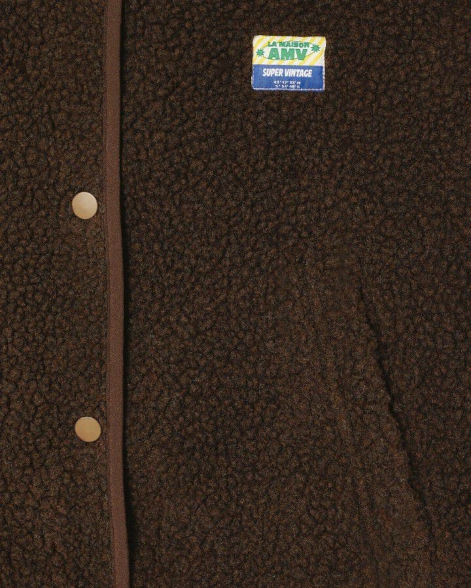 JONES + CO Hoktown sleeveless jacket in chestnut tree melange shearling with snap buttons and branded chest patch