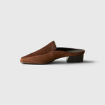 JONES + CO Felix loafer mule in chocolate calf hair with a square toe and sculpted leather-wrapped wood heel.