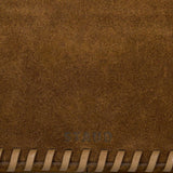 JONES + CO Harlow Bag in cigar brown suede featuring decorative leather whipstitch edging and embossed logo detail.