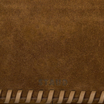 JONES + CO Harlow Bag in cigar brown suede featuring decorative leather whipstitch edging and embossed logo detail.