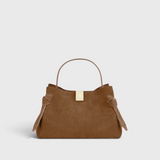 JONES + CO Gyoza Mini handbag in cognac suede with a top handle and gold-tone hardware detail.