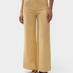 JONES + CO Syna high-rise wide-leg pants in daffodil yellow linen, featuring a smooth fitted waist and cropped hem.