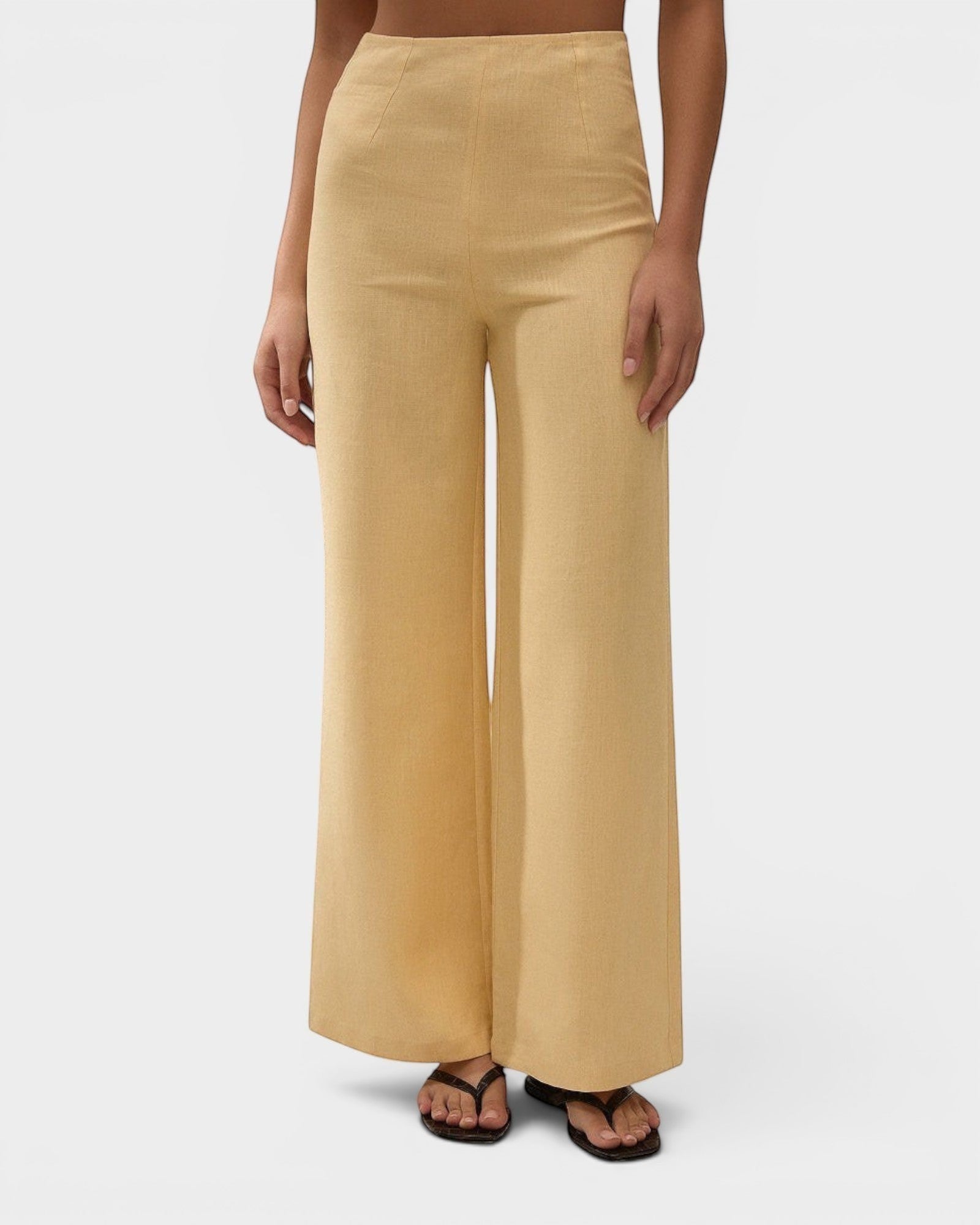 JONES + CO Syna high-rise wide-leg pants in daffodil yellow linen, featuring a smooth fitted waist and cropped hem.