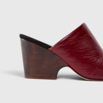 JONES + CO Rachel Comey Dahl scarlet leather wedge mule with a sculptural wooden heel and angular peep toe