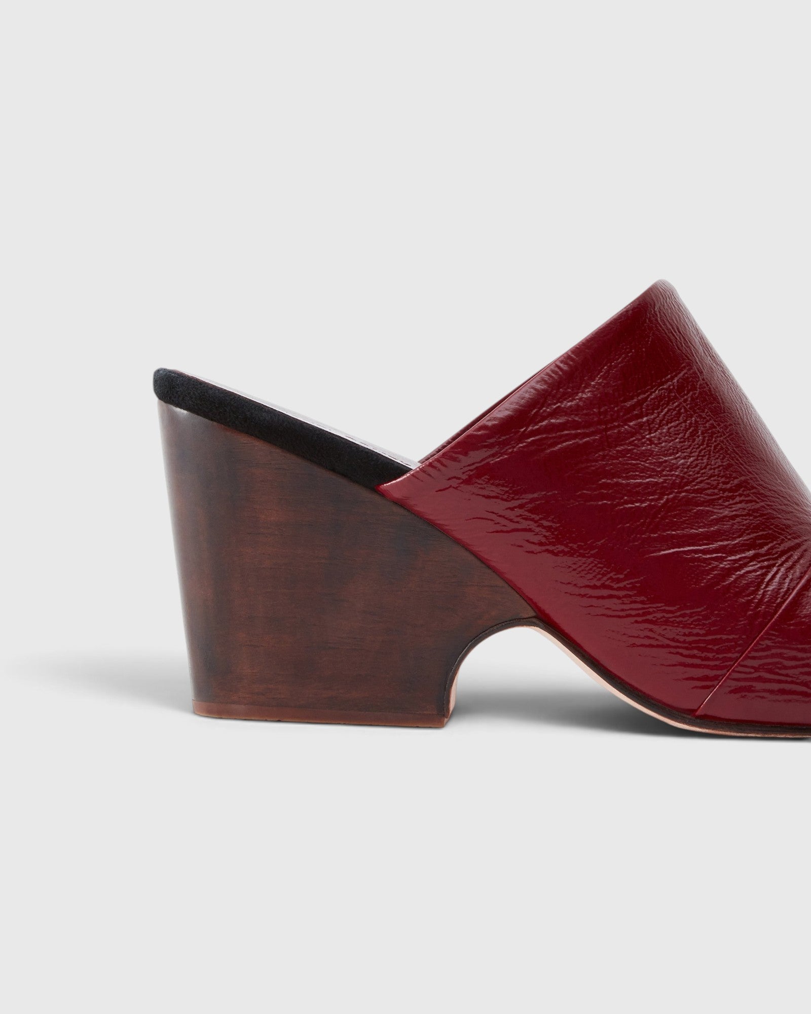 JONES + CO Rachel Comey Dahl scarlet leather wedge mule with a sculptural wooden heel and angular peep toe