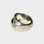 JONES + CO Dean sculptural sterling silver ring featuring a deep blue star sapphire, handmade in Taxco, Mexico.