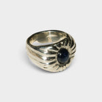 JONES + CO Dean ring in polished .925 sterling silver featuring a bold, sculptural design with a blue star sapphire.