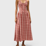 JONES + CO Del Rose midi dress in terra rosso check cotton with halterneck, front tie, and flattering V-waistline.