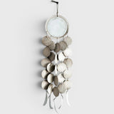 JONES + CO Dreamweaver wall hanging in Full Moon White, featuring stoneware discs, porcelain, and hemp rope.