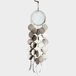 JONES + CO Dreamweaver wall hanging in Full Moon White, featuring stoneware discs, porcelain, and hemp rope details.