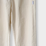 JONES + CO Gardener's Pants in ecru cotton-nylon with carpenter-style front patch pockets and a relaxed fit.