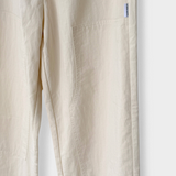 JONES + CO Gardener's Pants in ecru cotton-nylon with carpenter-style front patch pockets and a relaxed fit.