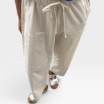 JONES + CO ecru gardener pants in lightweight cotton-nylon with an elastic waist, drawstring, and utility pockets.