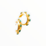 JONES + CO Havana Glow hoop earrings featuring raw Colombian emeralds set in 24K gold-plated brass.