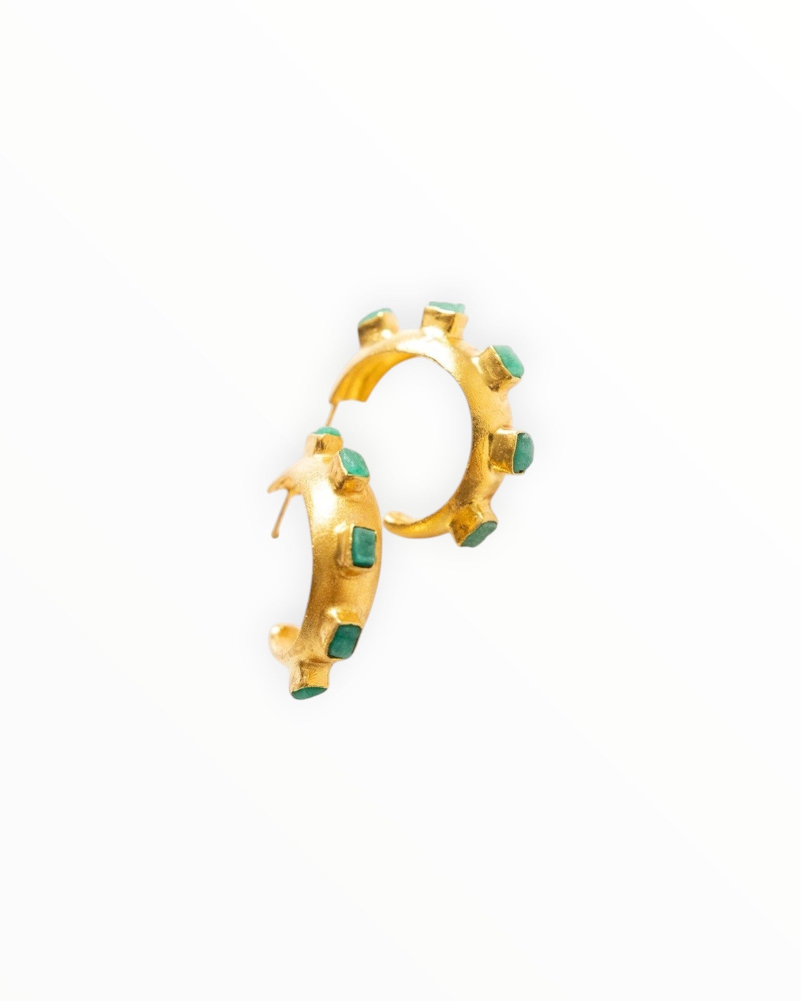 JONES + CO Havana Glow hoop earrings featuring raw Colombian emeralds set in 24K gold-plated brass.