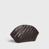 JONES + CO Elin Pouch in espresso brown braided calfskin with a zip closure and woven texture.