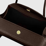 JONES + CO Oyster shoulder bag in espresso brown pebbled leather with gold magnetic snap closure
