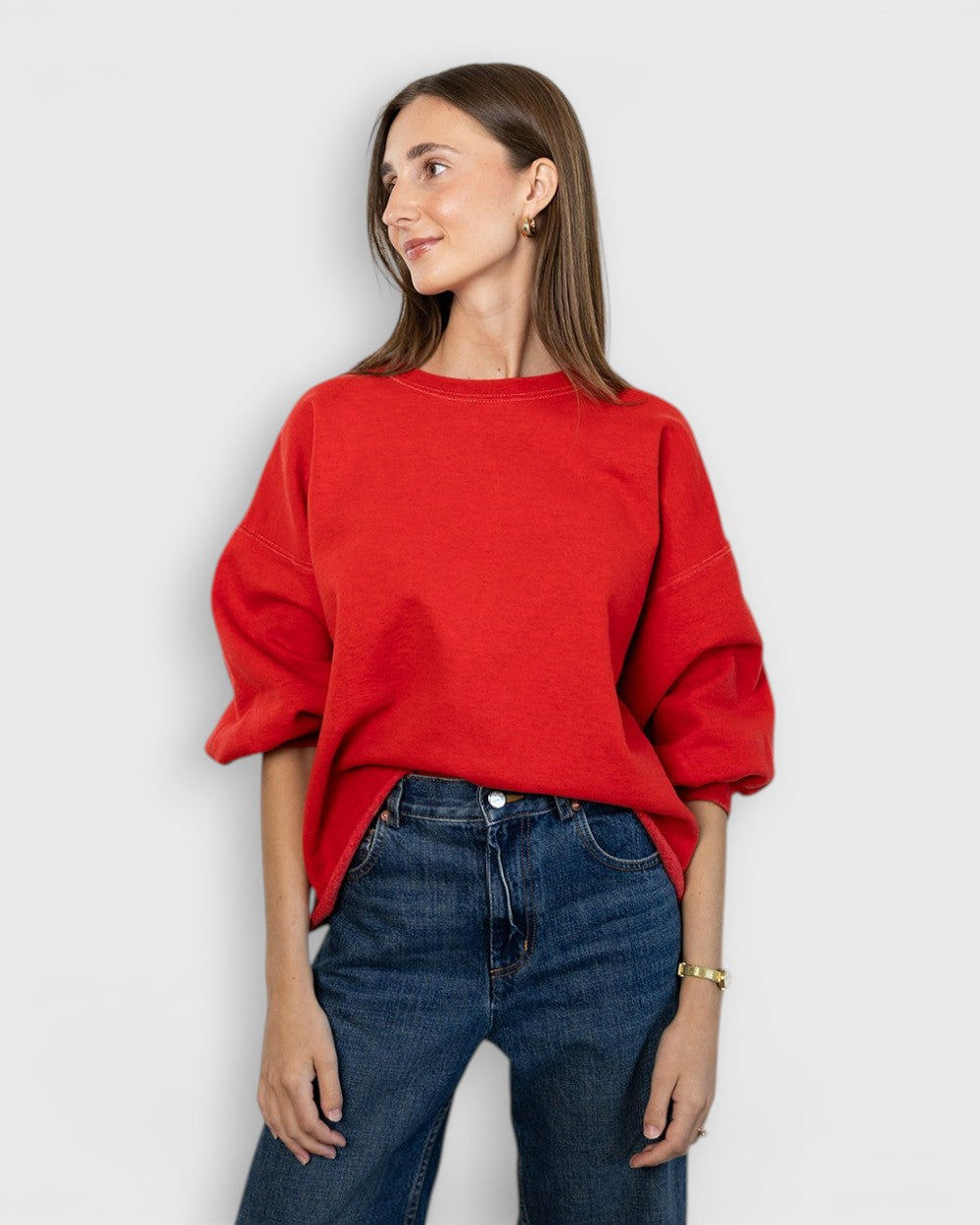 JONES + CO Rachel Comey Fond cherry red crewneck sweatshirt with drop shoulders and raw edge hem on a model