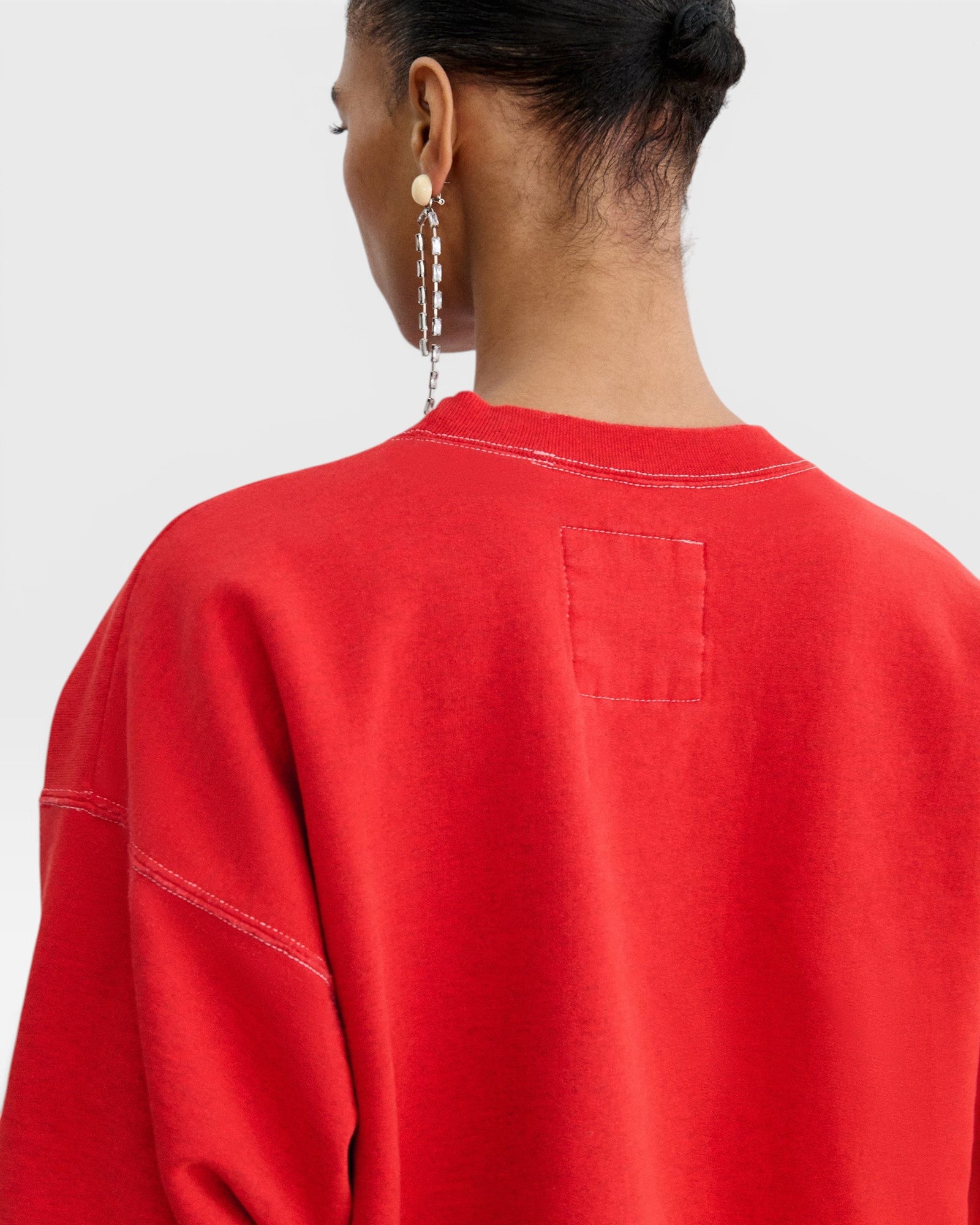 JONES + CO Rachel Comey Fond cherry red crewneck sweatshirt with drop shoulders and raw edge detailing on back