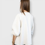 JONES + CO Rachel Comey Fond sweatshirt in dirty white with drop shoulders and raw edge hem, back view