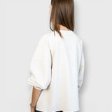 JONES + CO Rachel Comey Fond sweatshirt in dirty white with drop shoulders and raw edge hem, back view