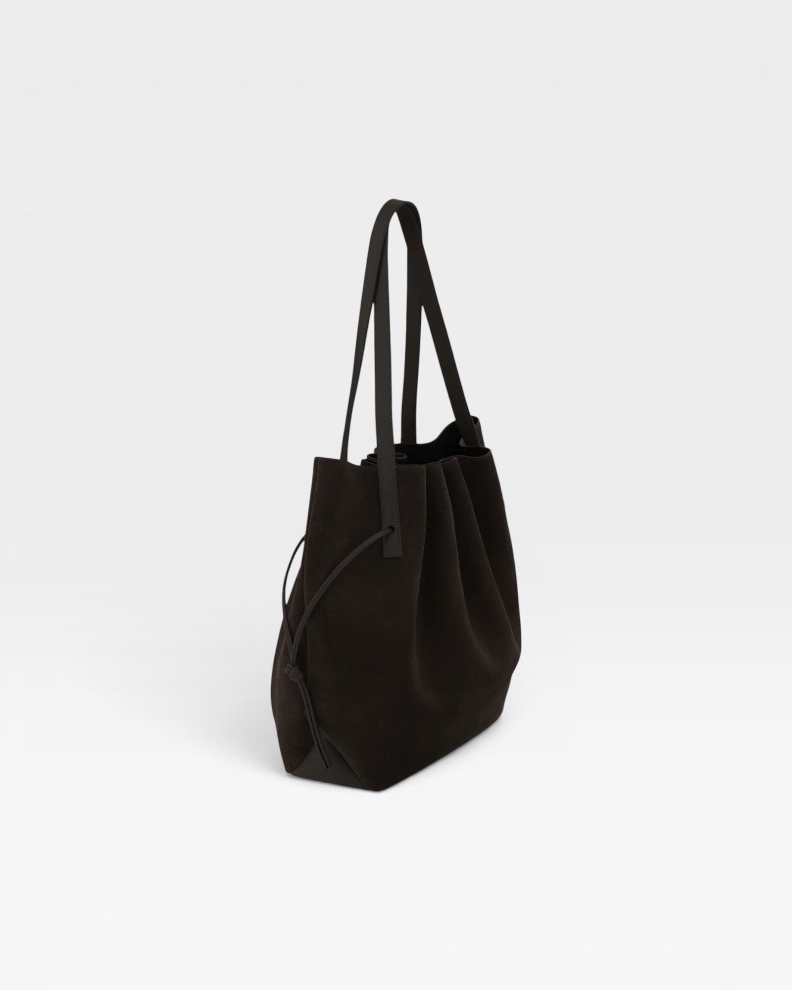 JONES + CO Scallop Tote in dark brown ganache suede with a spacious design and long shoulder straps