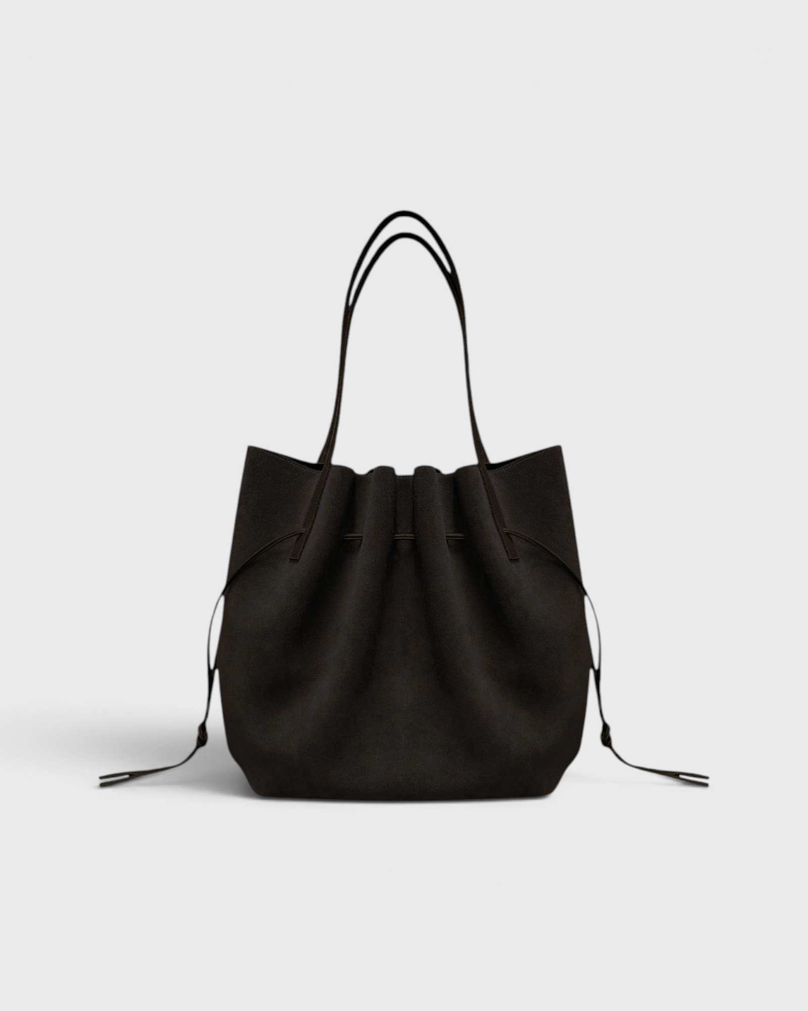 JONES + CO Scallop Tote in rich ganache brown suede with a gathered drawstring design and slim shoulder straps.