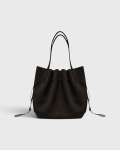 JONES + CO Scallop Tote in rich ganache brown suede with a gathered drawstring design and slim shoulder straps.