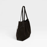 JONES + CO Scallop Tote in dark brown ganache suede with a spacious design and long shoulder straps