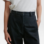 JONES + CO Garra high-waisted black denim jeans with a relaxed wide-leg fit and contrast side panel detail.
