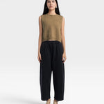 JONES + CO ginger boucle crop tank top with hand crochet edge detail worn by a model with black trousers
