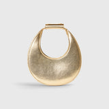 JONES + CO Good Night Moon evening bag in polished gold with a crescent jewel-box silhouette and top handle