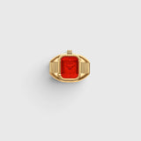 JONES + CO Nocturne Time Ring featuring an 18K deep gold-plated rectangular case and a vibrant flame-colored crystal.