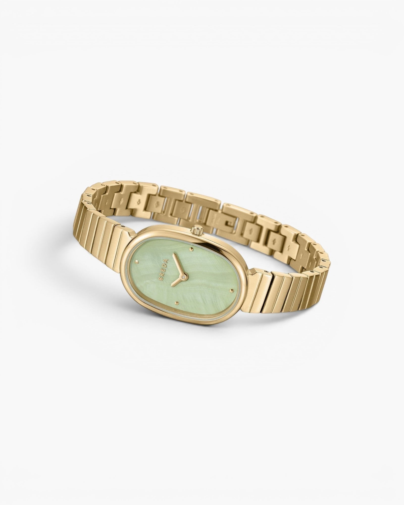 JONES + CO Jane watch featuring a gold-plated stainless steel oval case and bracelet with a mint green dial.