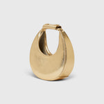 JONES + CO Good Night Moon evening bag in polished gold with a crescent jewel-box silhouette and top handle