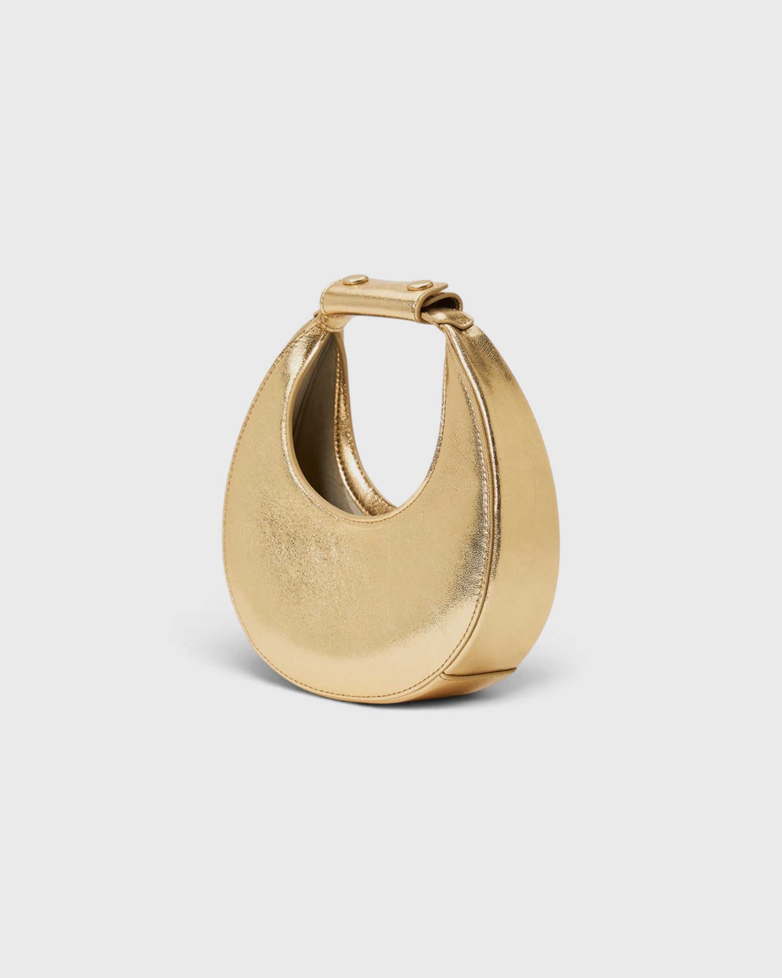 JONES + CO Good Night Moon evening bag in polished gold with a crescent jewel-box silhouette and top handle