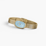 JONES + CO Jane Small watch with a gold woven mesh bracelet and an oval sky blue mother of pearl dial.