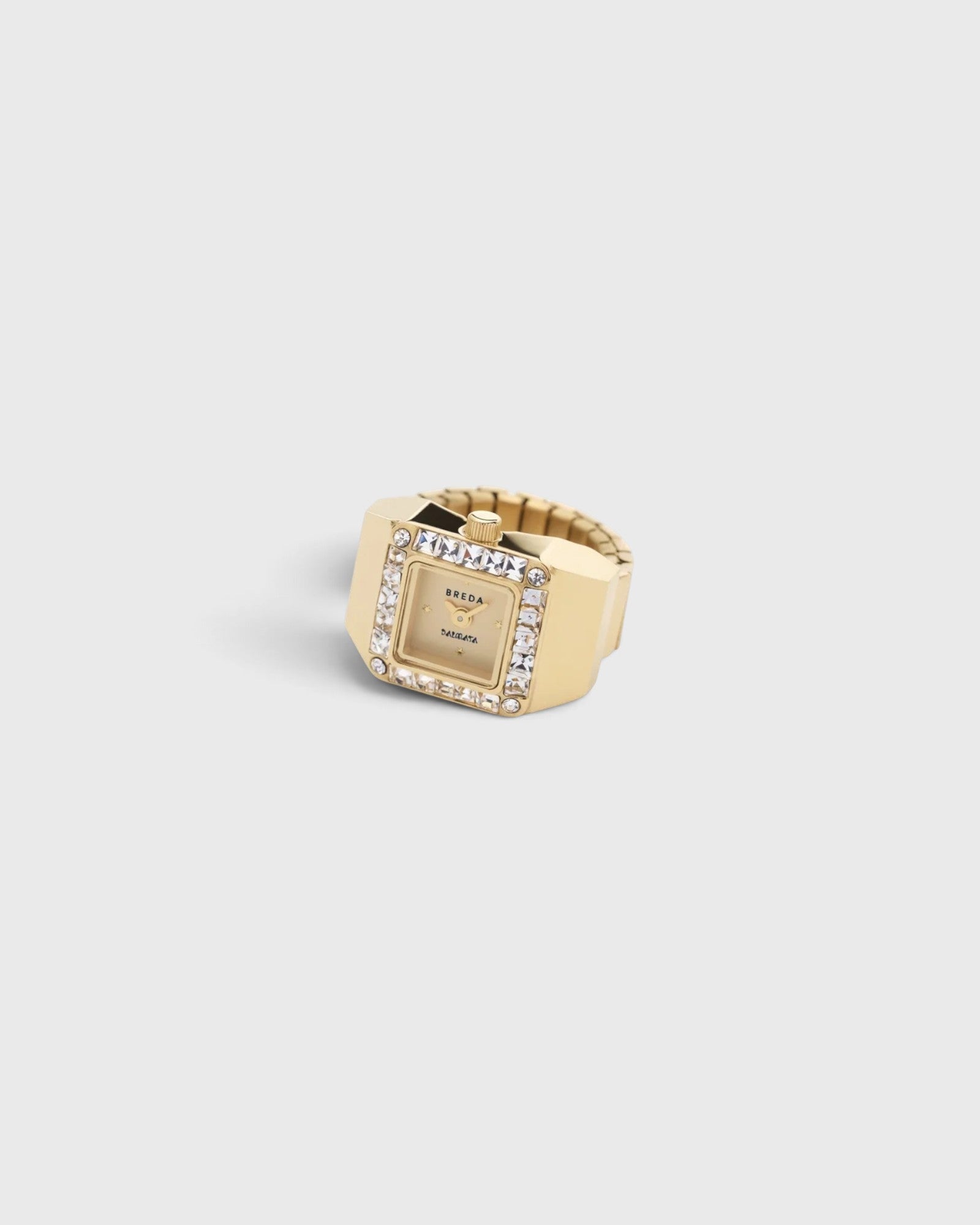 JONES + CO Breda x Dalmata gold-plated stainless steel ring watch with a crystal-covered square bezel and band.