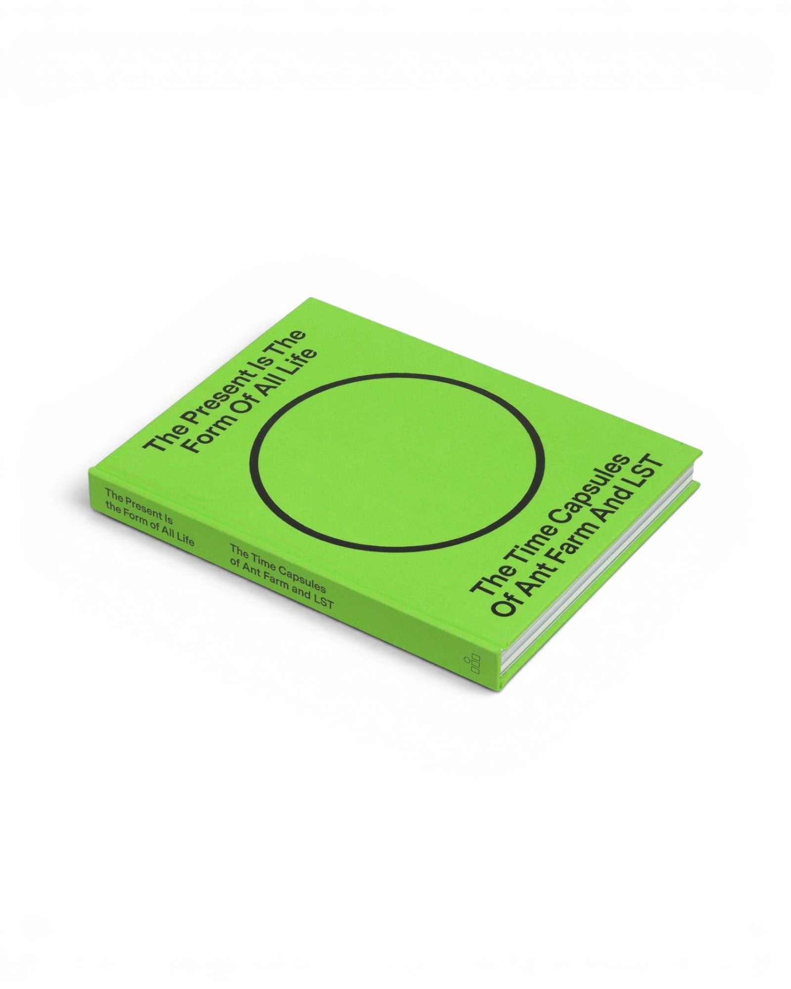 JONES + CO hardcover book titled The Present Is the Form of All Life with a bright green cover and black circle graphic.